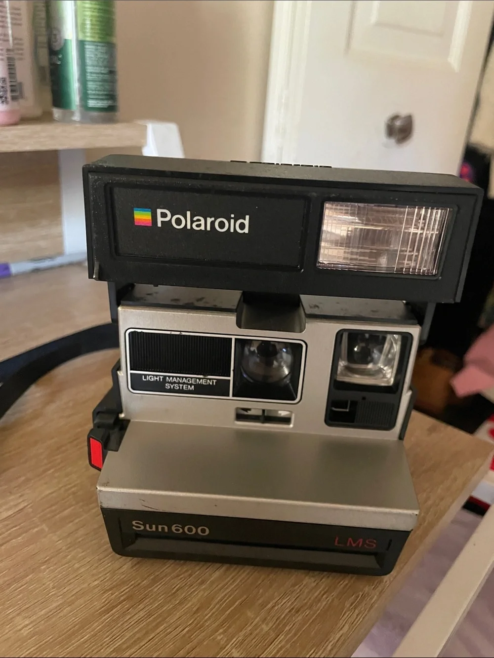 Polaroid Sun 600 LMS Instant Camera - Black & Silver with Color Stripe